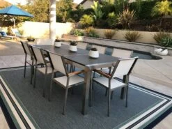 Gartenmöbel Set Naturstein Schwarz Geflammt 220 X 100 Cm 8-Sitzer Stühle Textilbespannung Weiß GROSSETO -Beliani Verkaufsgeschäft undef src sa picid 679729 type whitesh image