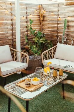 Lounge Set Rattan Natürlich 4-Sitzer Auflagen Hellgrau CORINTH II 18 Lounge Set Rattan Natürlich 4-Sitzer Auflagen Hellgrau CORINTH II -Beliani Verkaufsgeschäft undef src sa picid 831757 type whitesh image